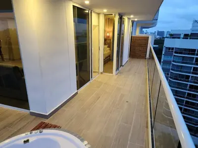 a balcony of a building with a tub in a room at Dominique luxury 1410 Jacuzzi Privado in Cartagena de Indias
