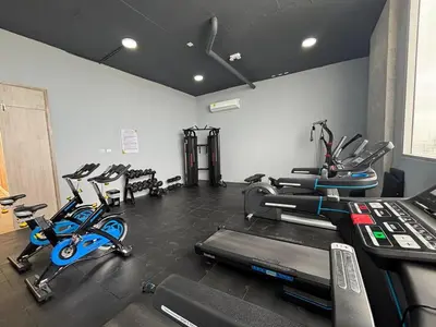 a gym with several exercise bikes in a room at Cartagena SUNNO BEACH in Cartagena de Indias