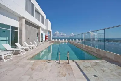 a swimming pool on the side of a building at Palmetto Sunset 3204 in Cartagena de Indias
