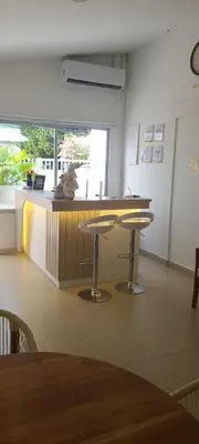 a room with a counter with a dog sitting on a table at Casa Mishka Hotel Boutique Habitación #104 Nuevo Cartagena in Cartagena de Indias