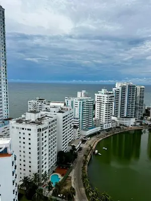 a city with tall buildings and a body of water at APARTAMENTO NUEVO Y ACOGEDOr in Cartagena de Indias