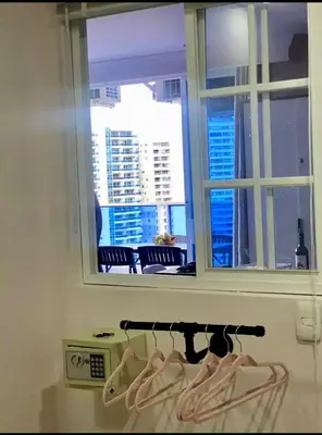 a window in a room with a view of a city at APARTAMENTO NUEVO Y ACOGEDOr in Cartagena de Indias