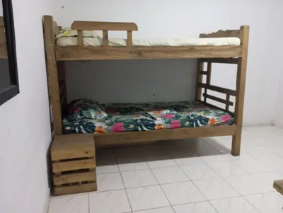 a couple of bunk beds in a room at Nahimara Champeta Hostel in Cartagena de Indias