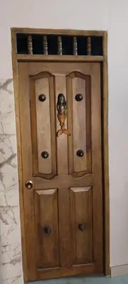 a wooden cabinet with drawers in a room at Portalon de Magallanes apto para familias in Cartagena de Indias