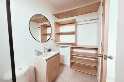a small bathroom with a sink and a mirror at Cabaña 5 Playa Piso 1- Palmar De Los Vientos-San Bernardo del Viento in Pueblo Coco