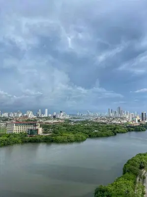 a large river with a city in the background at New Luxury Apartment in Cartagena in Cartagena de Indias