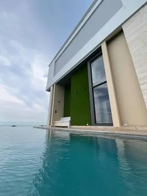 a building next to a body of water at New Luxury Apartment in Cartagena in Cartagena de Indias