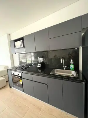 a kitchen with a sink and a stove at New Luxury Apartment in Cartagena in Cartagena de Indias