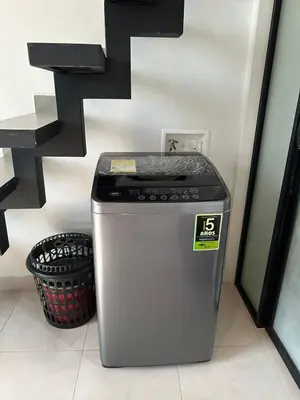 a trash can sitting next to a staircase at Apartaestudio Amoblado Tipo Loft en Barrio la Campiña in Cartagena de Indias