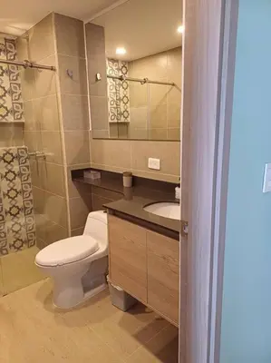 a bathroom with a toilet and a sink at New Apartment very close to Airport and beaches in Cartagena de Indias