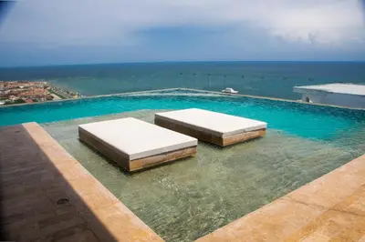 two beds in the water on top of a building at Muranocentro1601 in Cartagena de Indias