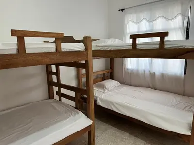 a couple of bunk beds in a room at Hospedaje Las Palmas apto 203 in Cartagena de Indias