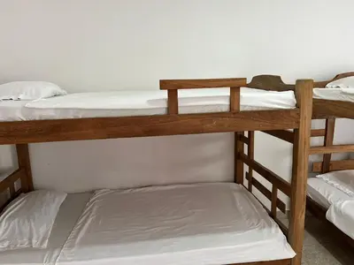 a group of bunk beds in a room at Hospedaje Las Palmas apto 203 in Cartagena de Indias
