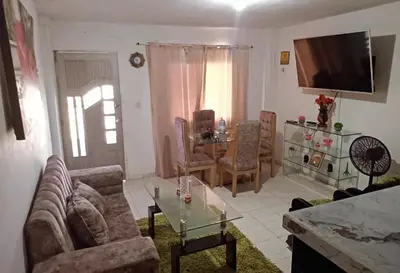 a living room with a couch and a table at Casa rosymar in Cartagena de Indias