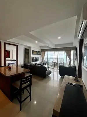 a living room with a couch and a table at Paraíso en Bocagrande con Vista al Mar in Cartagena de Indias