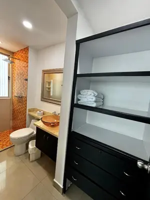 a bathroom with a sink and a toilet and a shower at Paraíso en Bocagrande con Vista al Mar in Cartagena de Indias