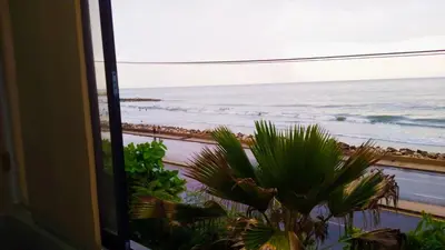 a view of the ocean from a window at Apto espectacular frente al mar in Cartagena de Indias