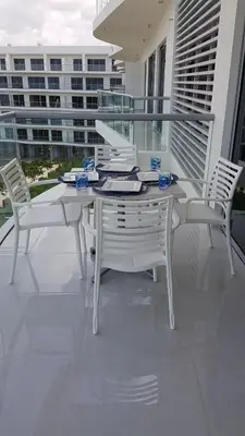 a white table and chairs on a balcony at Apartamento Vista al Mar Morros Eco in Cartagena de Indias