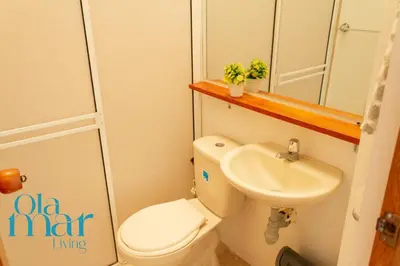 a small bathroom with a toilet and a sink at Atardeceres bloque A in Coveñas