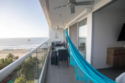 a balcony with a view of the beach at Hermoso apartamento con vista al mar in Cartagena de Indias