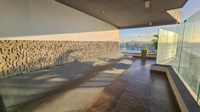 a room with a wall with a mural on it at Hermoso apartamento con vista al mar in Cartagena de Indias