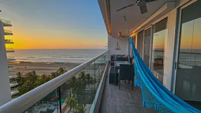 a balcony of a condo with a view of the beach at Hermoso apartamento con vista al mar in Cartagena de Indias