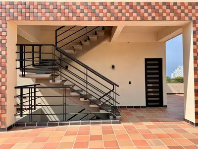 a staircase on the side of a brick building at Santa Donama Paradise in Santa Marta