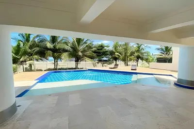 a swimming pool in the middle of a house at 2 dormitorios Morros. Vistas y salida playa in Cartagena de Indias