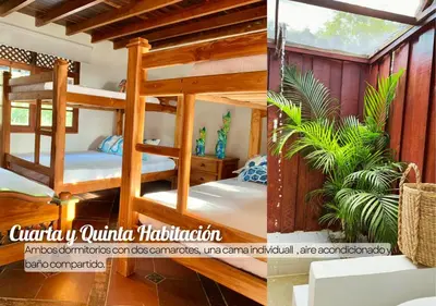 a bedroom with two bunk beds in a house at Beautiful Luxury Beachfront Hosue in Lorica