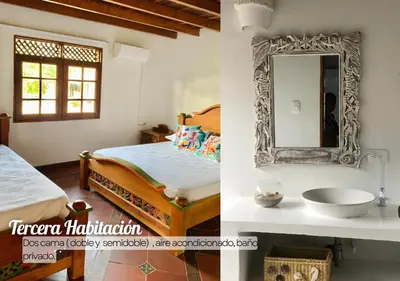 a bedroom with a bed and a mirror and a sink at Beautiful Luxury Beachfront Hosue in Lorica