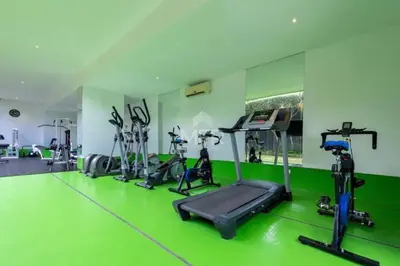 a gym with several treadmills and exercise bikes at Morros Vitri Beachfront & 2 Bedrooms in Cartagena de Indias