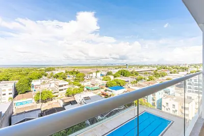 a view of the city from the balcony of a building at Lujoso Apartamento Cartagena - 2 mins aeropuerto in Cartagena de Indias