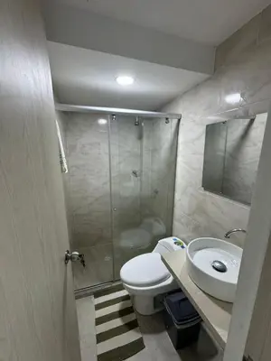a bathroom with a shower and a toilet and a sink at Apartamento en Coveñas in Coveñas