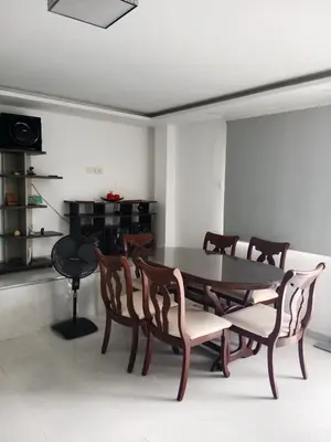 a dining room with a table and chairs at Casa Topacio in Cartagena de Indias