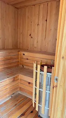 an empty sauna with wooden walls and wooden floors at Amplio y hermoso apartamento para disfrutar in Barranquilla
