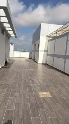 an empty building with a tiled floor and a sky at Amplio y hermoso apartamento para disfrutar in Barranquilla