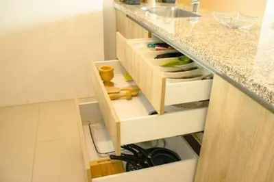 a kitchen with an open drawer with dishes at Luxury View, 3 Rooms in Cartagena de Indias