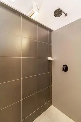 a shower stall in a bathroom with a ceiling at Loft en Corazón de Ciudad Antigua in Cartagena de Indias