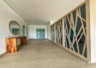 a hallway of a house with a mirror on the wall at Apartamento 4g Baia Kristal Cartagena in Cartagena de Indias