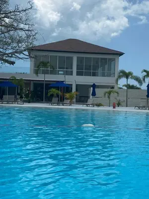 a swimming pool with a building in the background at Apartamento 4g Baia Kristal Cartagena in Cartagena de Indias