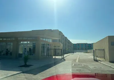 an empty parking lot in front of a building at Apartamento Amoblado en Cartagena in Cartagena de Indias