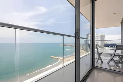 an ocean view from the balcony of a house at Awesome Sea View and Historic Center “Morros City” in Cartagena de Indias