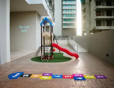 a playground in a building with a slide at Espectacular apto Loft NUEVO- Frente al Hilton Pozos Colorados in Santa Marta