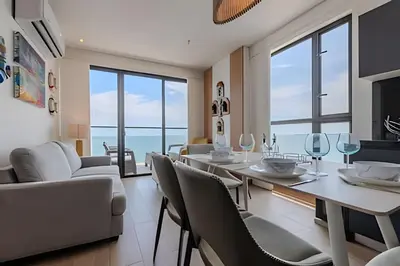 a dining room with a view of the ocean at Espectacular Vista al Mar and Historic Center 2BR in Cartagena de Indias