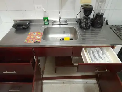 a kitchen counter with a sink and a counter top at Apartamento Cartagena Torices 50 in Cartagena de Indias