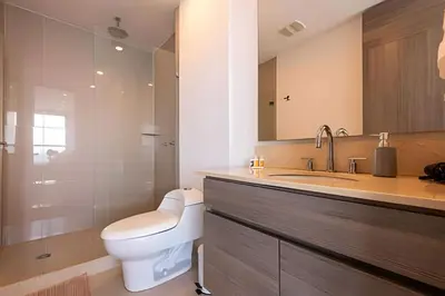 a bathroom with a toilet and a sink and a shower at Exclusive Sea View “Morros City” 30th Fl in Cartagena de Indias