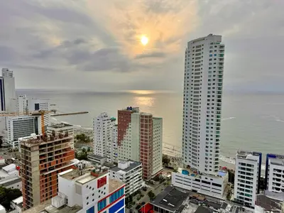 a view of the ocean from a city with tall buildings at apto navy 6 tripulantes in Cartagena de Indias