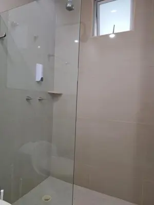 a bathroom with a shower with a glass door at Lujoso apto con vista al mar en Morros Ultra in Cartagena de Indias