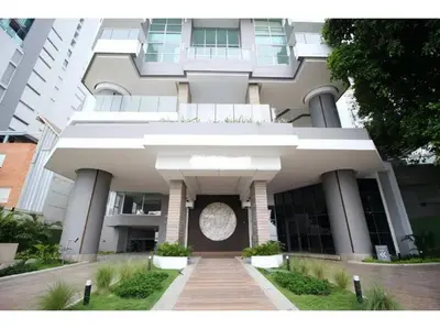 a building with a clock on the front of it at Luxury Apartment - Stunning Sea View in Cartagena de Indias