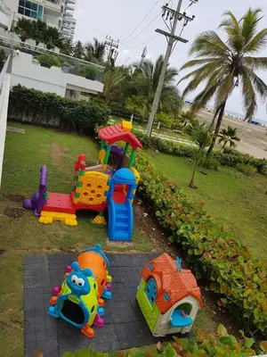 a childs playground with a toy train in a park at Apto en Morros Epic Cartagena in Cartagena de Indias